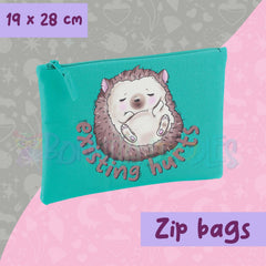 Teal zip pouch with cartoon hedgehog face graphic and zipper pull