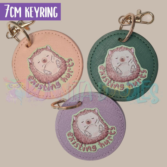Existing hurts keychain