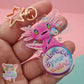 Embrace your weird axolotl keychain / charm.