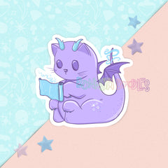 Purple cat-like creature with blue horns reading a book casting spells on a pastel background with stars.