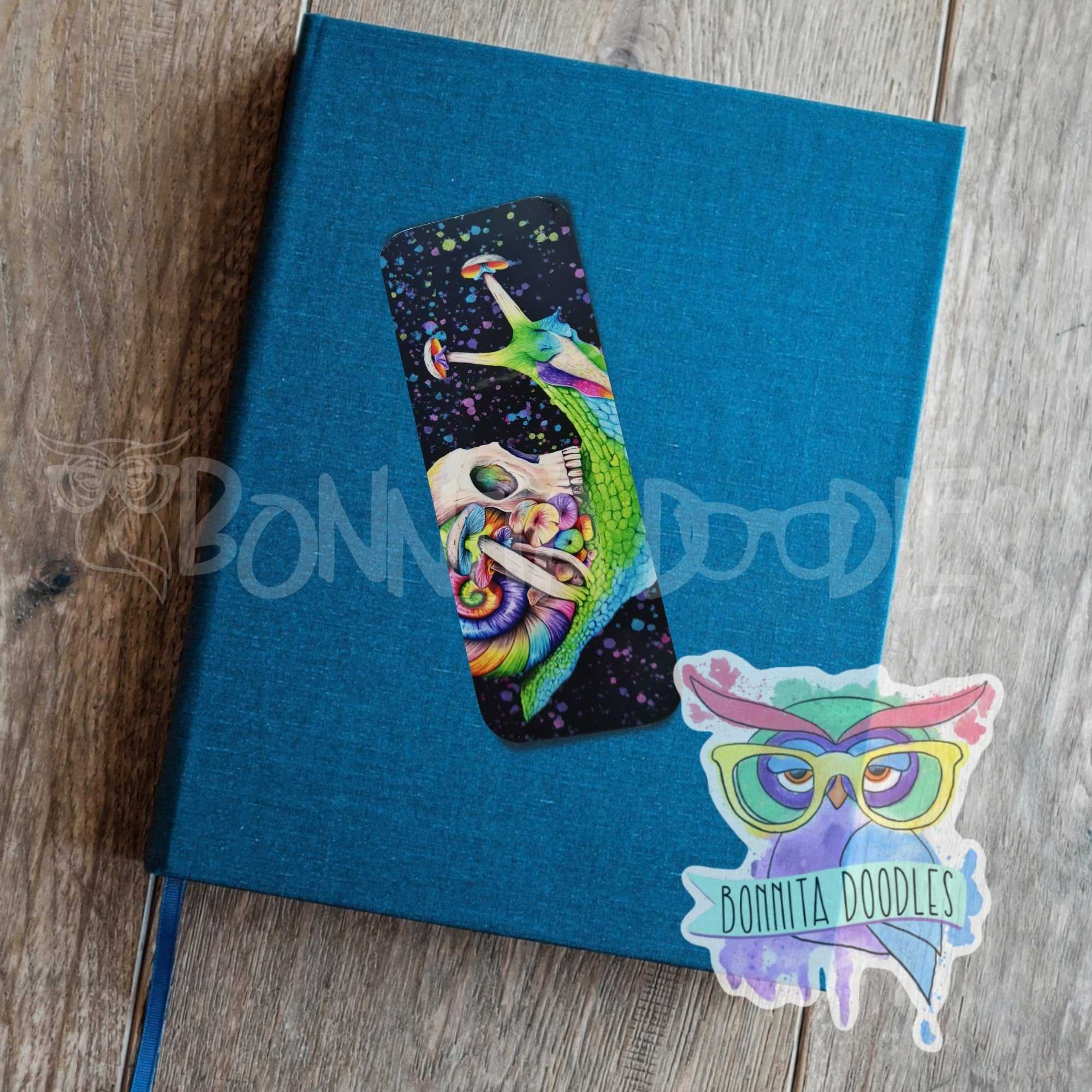 Skully snail rainbow snail laminated bookmark